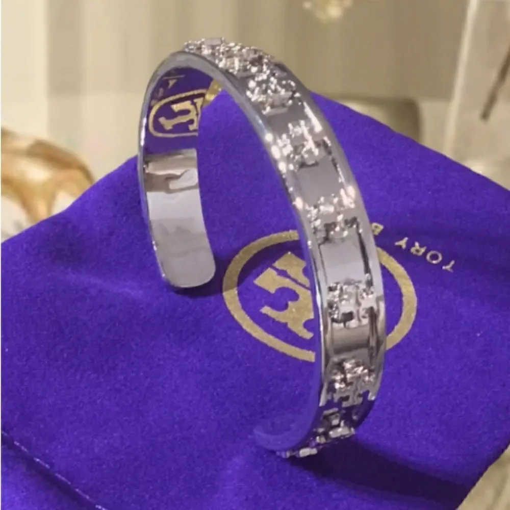 TORY BURCH RAISE LOGO SILVER OPEN CUFF BRACELET FITS MOST SIZES